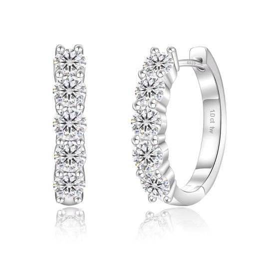 Silver hoop moissanite earrings with clear gemstones on a white background